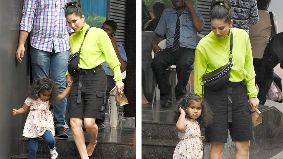 Sunny Leone pulls off a stunning neon outfit on her day out with kids - Photos