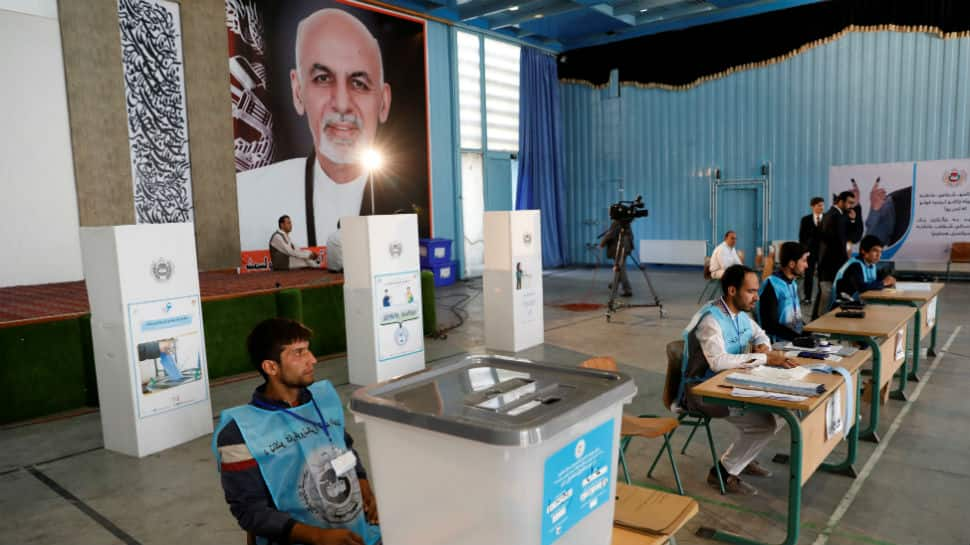 Afghanistan voters defy attacks, delays to vote for president