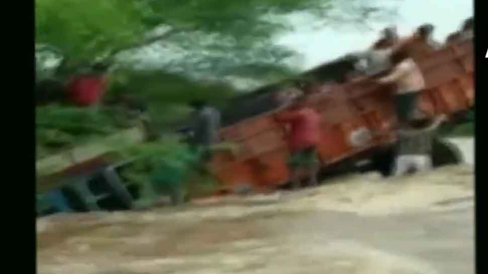 Narrow escape for students as truck carrying them veers off flooded road in Rajasthan - WATCH