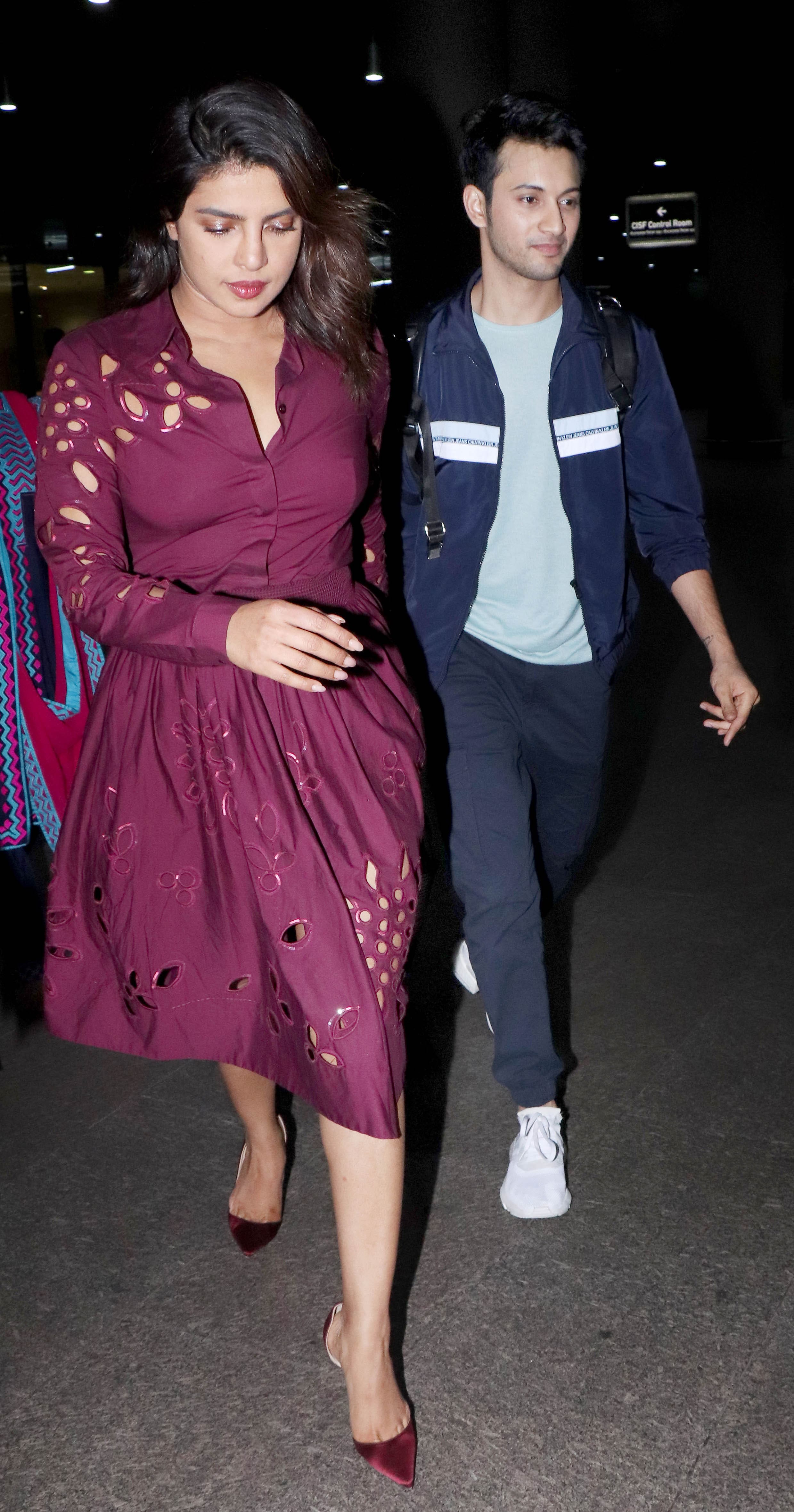 Priyanka Chopra and Rohan Saraf at the airport