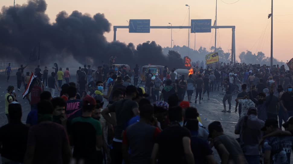 At least 18 killed in Iraq protests overnight, government issues new promises