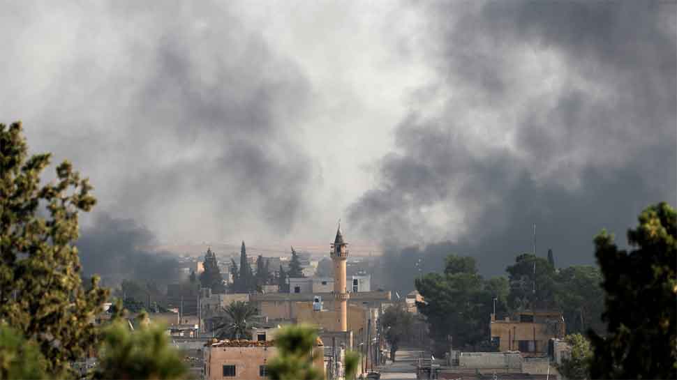 Thousands flee, dozens reported killed as Turkey pushes Syria assault