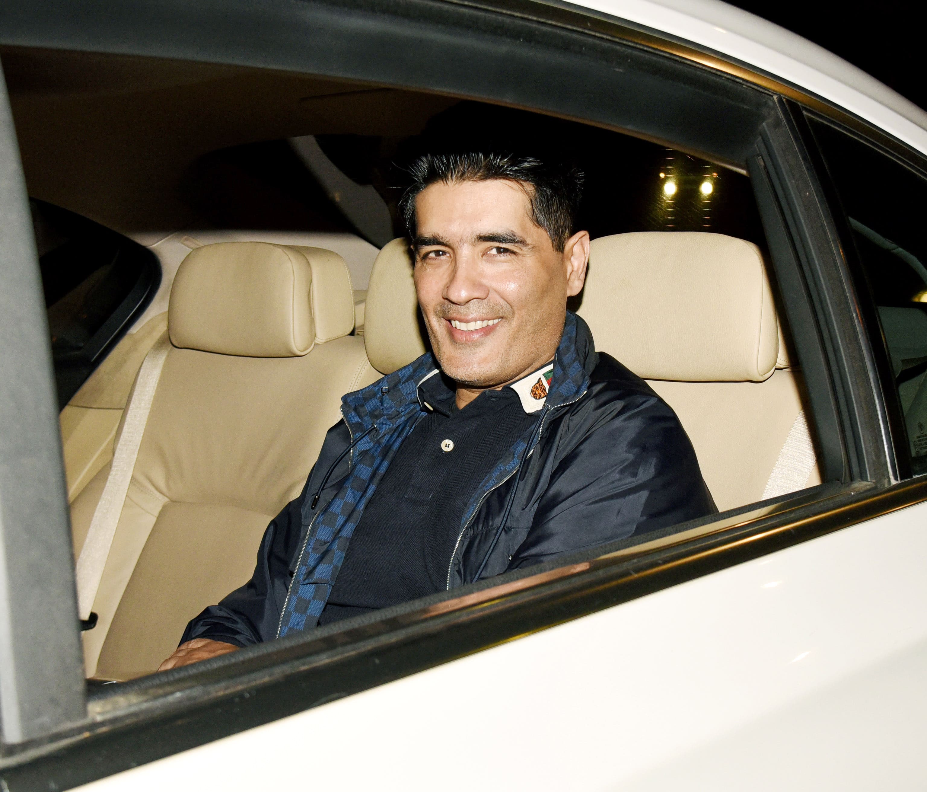 Manish Malhotra is all smiles at paps