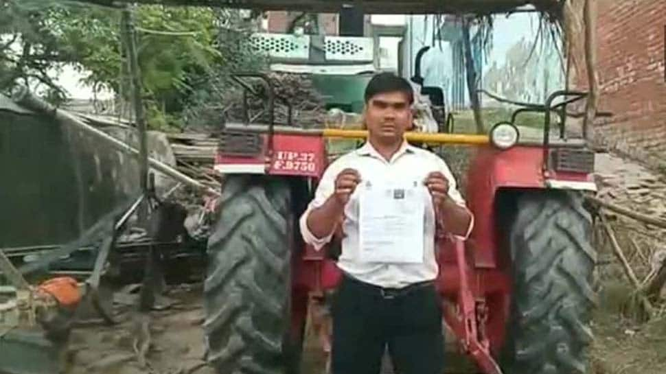 Tractor driver fined Rs 3,000 for driving without helmet, licence in UP&#039;s Hapur