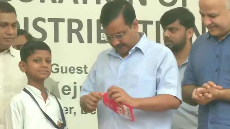 Arvind Kejriwal distributes masks to school students as pollution levels rise in Delhi