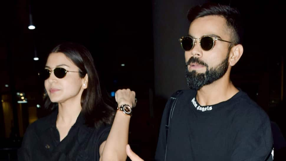 Anushka Sharma and Virat Kohli twin in black and white outfits