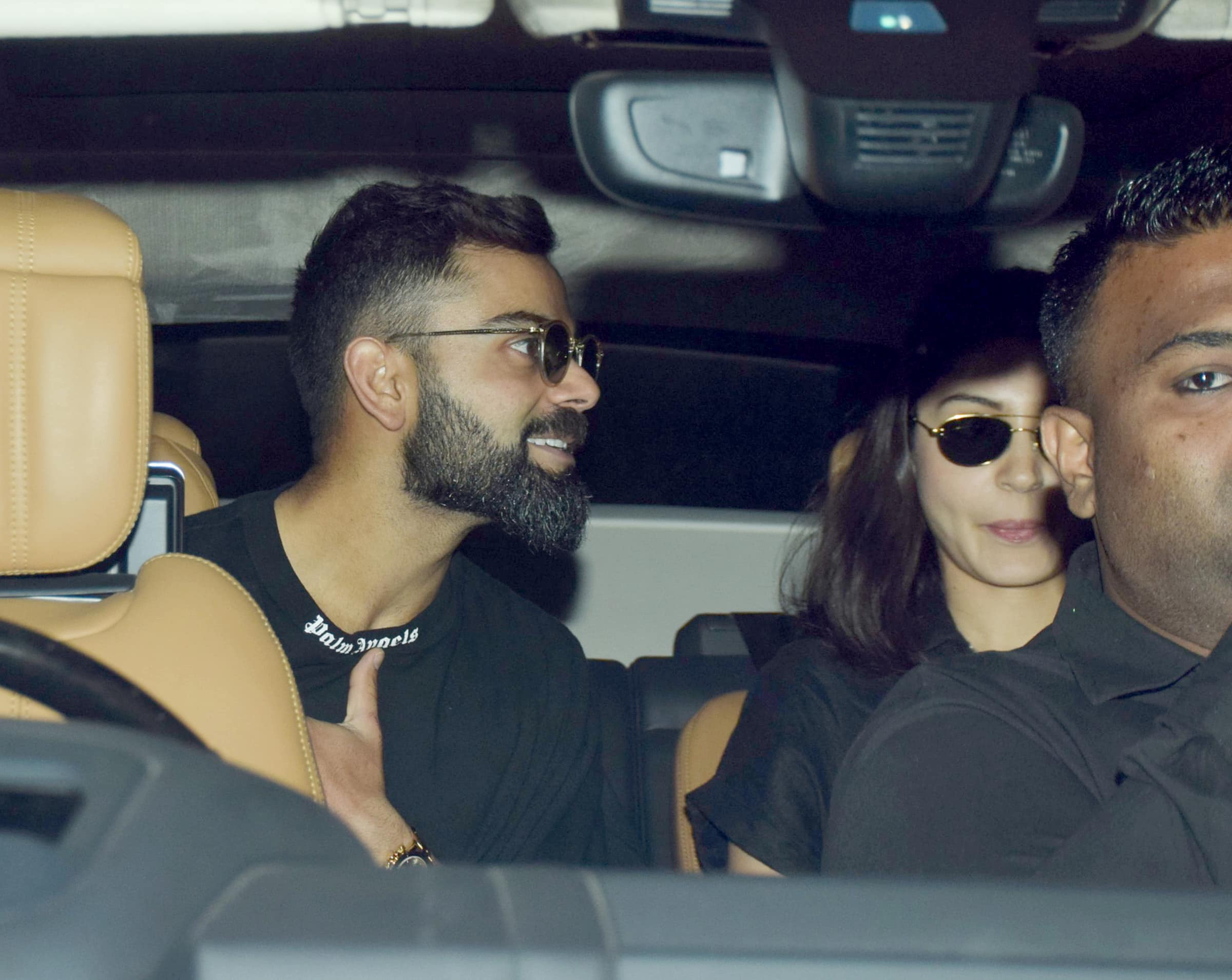 Anushka Sharma and Virat Kohli twin in black