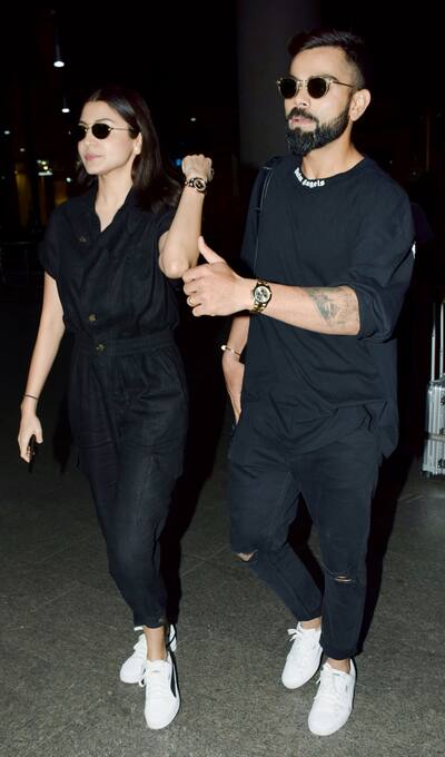 Anushka Sharma and Virat Kohli at the airport