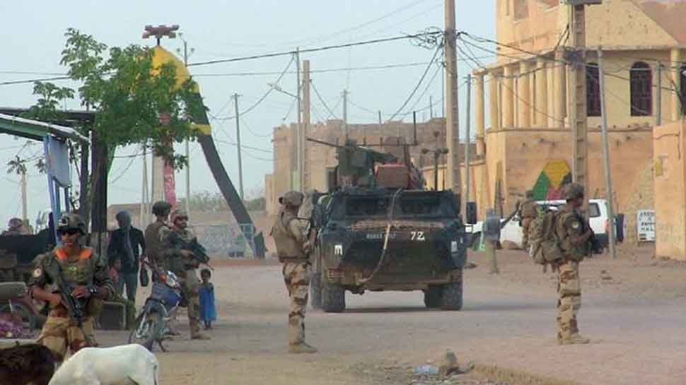 Militants kill 54 in attack on Mali army post, Islamic State claims responsibility