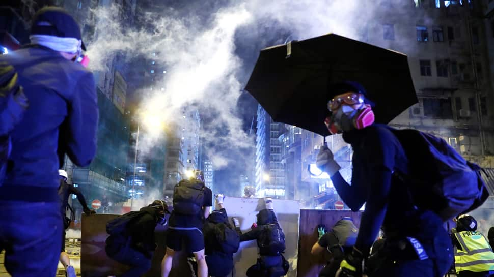 Hong Kong police fire tear gas as transport chaos grips city