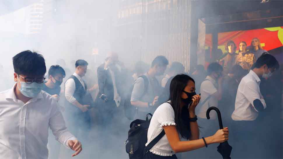 Isolated band of protesters holds out on trashed Hong Kong campus