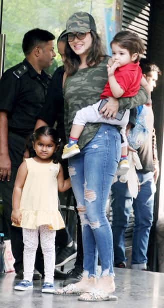 Sunny Leone poses with kids