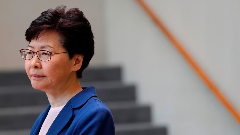 Hong Kong mall protests flare with leader Carrie Lam in Beijing