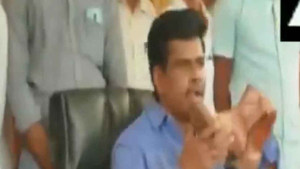 Andhra Pradesh MP licks police boots to protest remarks