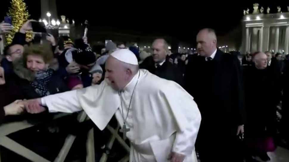 Pope Francis apologises for &#039;bad example&#039; of slapping arm of pilgrim who tugged him