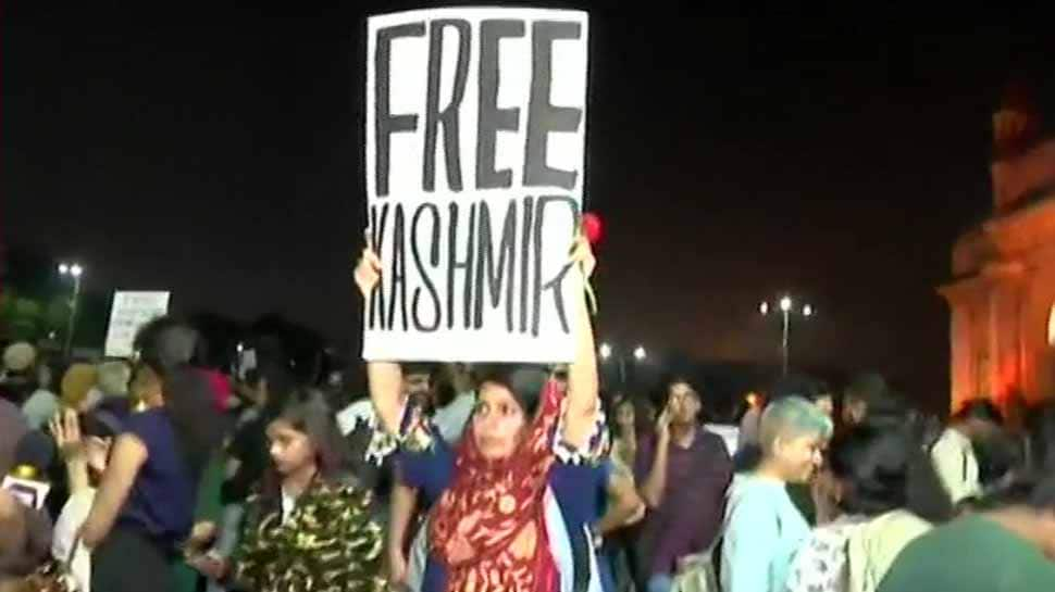 &#039;Free Kashmir&#039; poster seen at JNU solidarity march in Mumbai