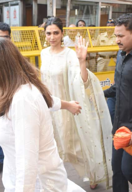 Deepika Padukone waves at paps