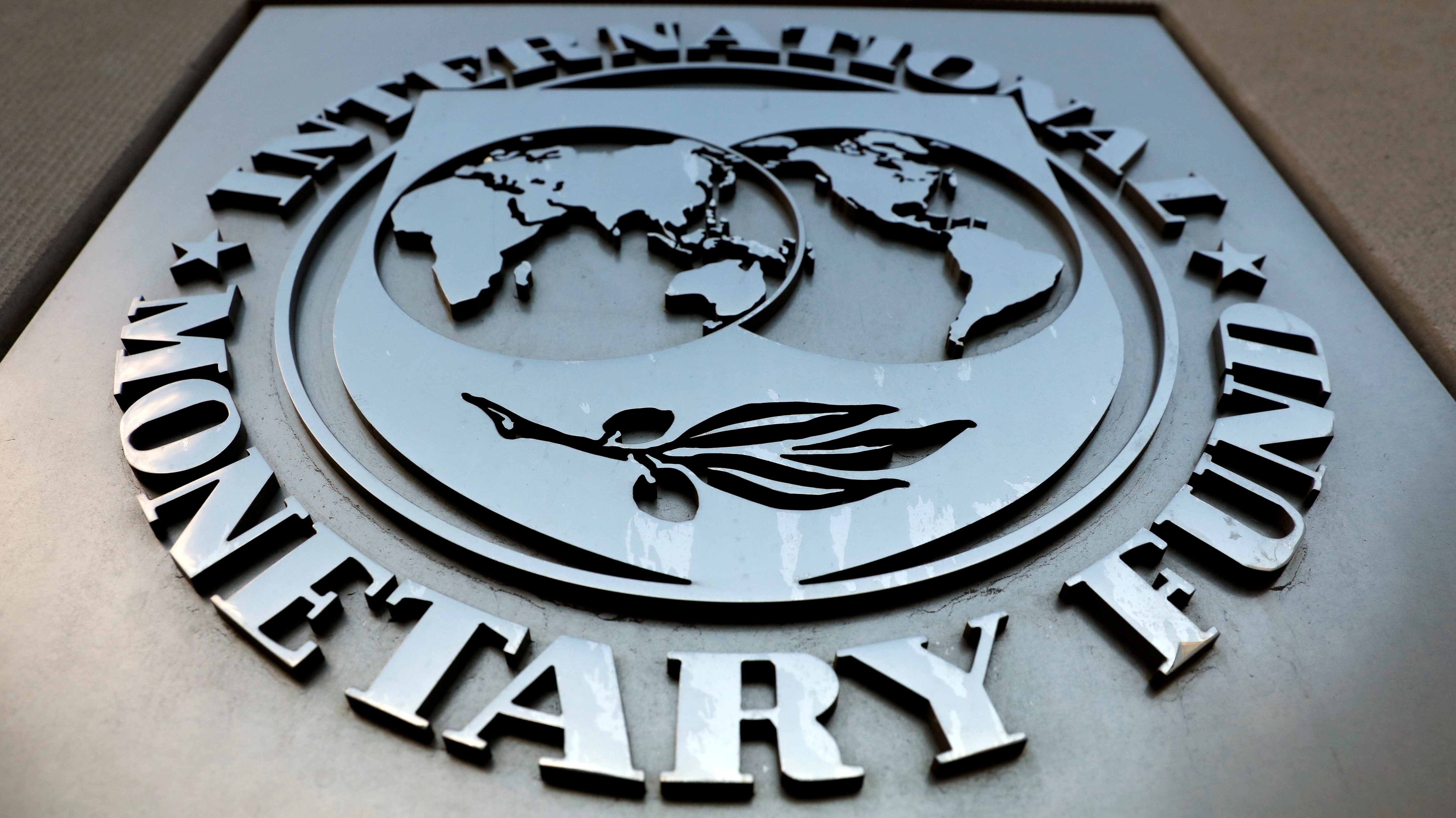 IMF cuts global growth forecasts as India falters, says bottom may be near