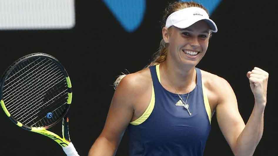 Caroline Wozniacki waves goodbye after third-round defeat at Australian Open