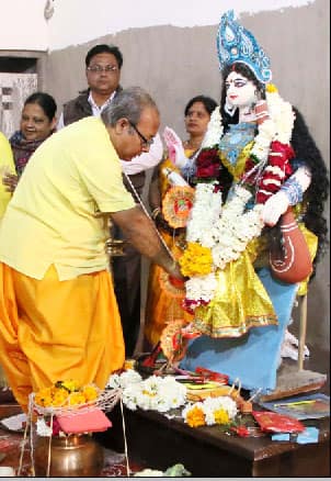 Goddess Saraswati being prayed to at a temple