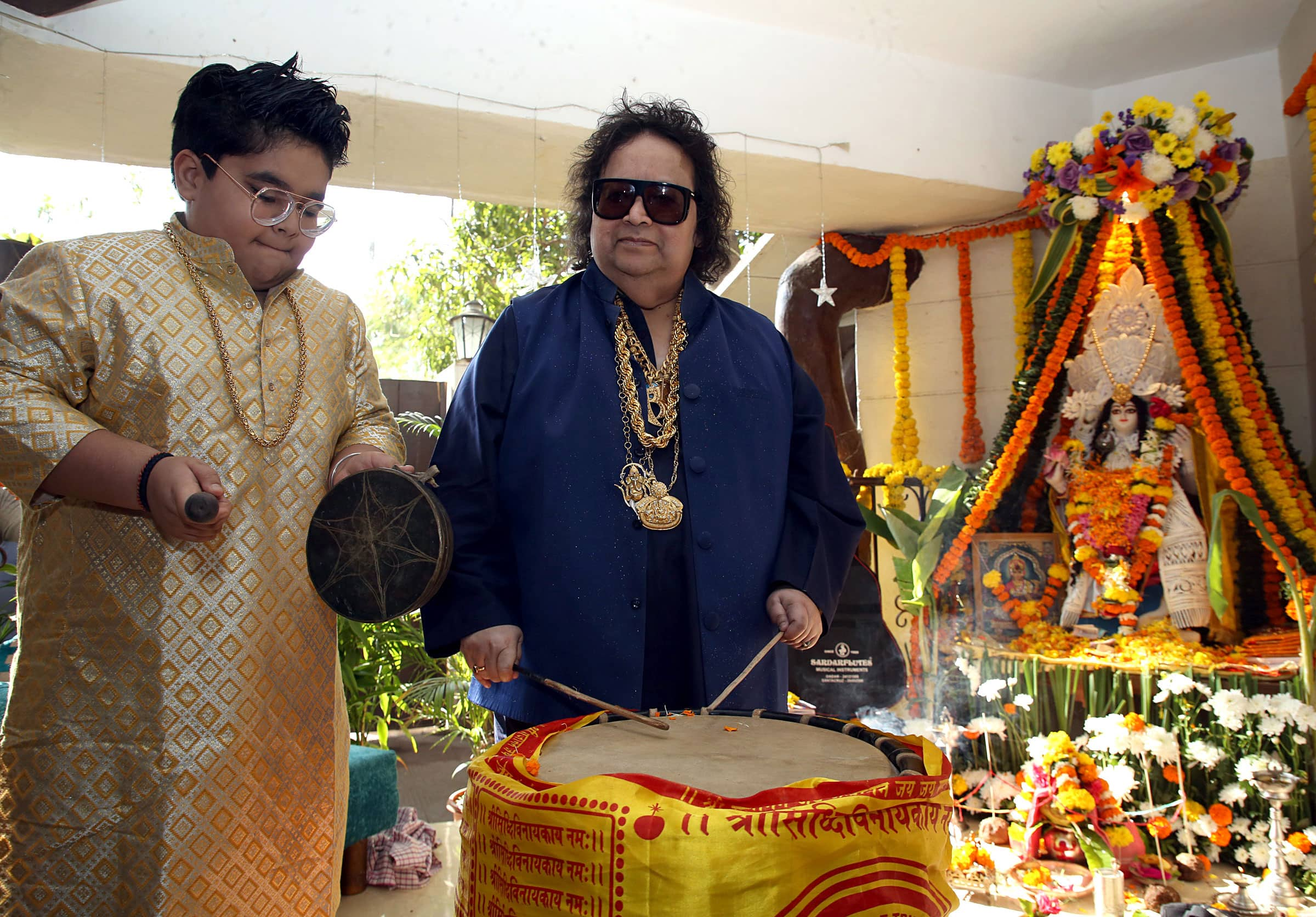 Bappi Lahiri celebrates Saraswati Puja at his residence