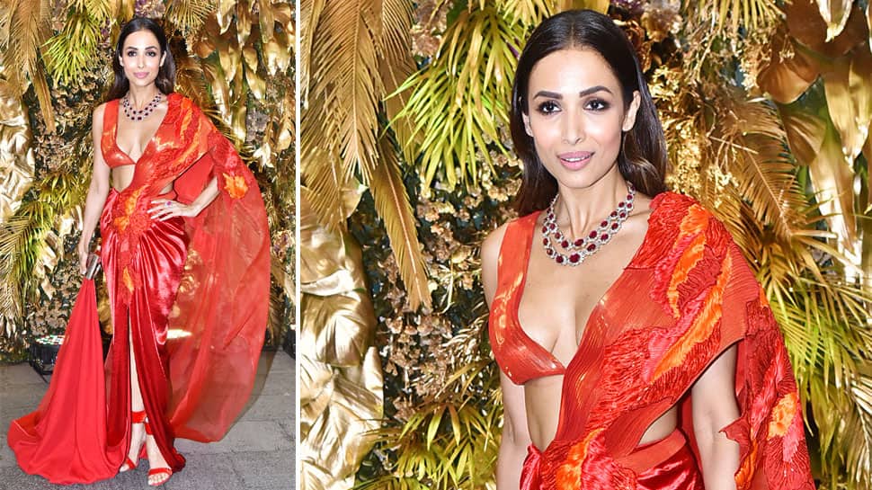 Entertainment News: Malaika Arora raises the temperature in a red hot modern saree look at Armaan Jain&#039;s reception 