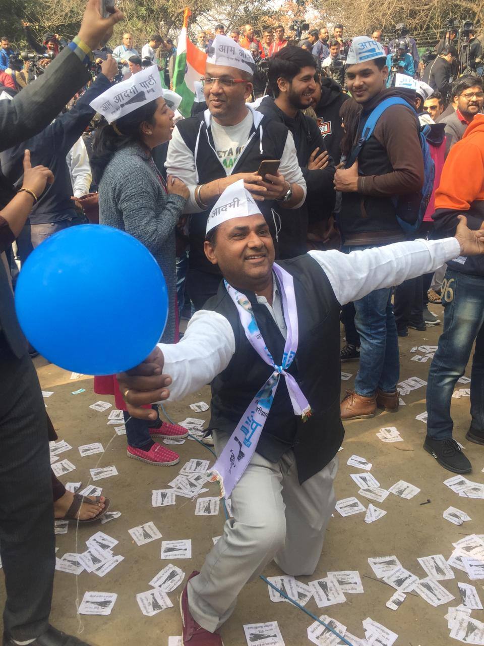 Supporter dances in joy