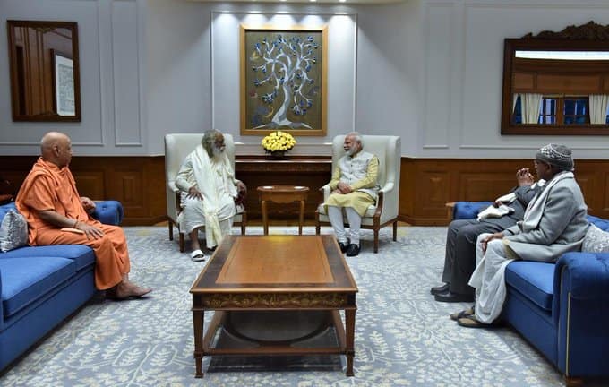 Ram Mandir Trust members meet PM Modi, invite him to visit Ayodhya 