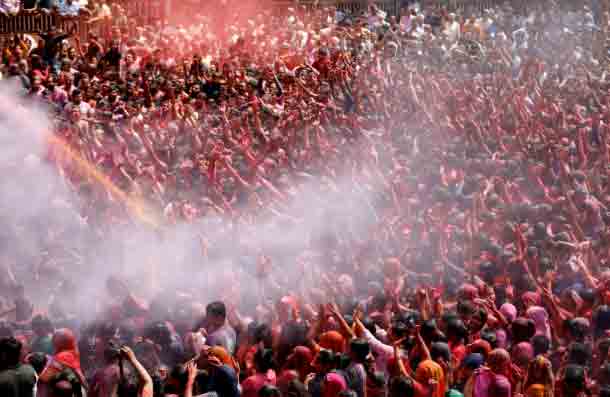 Devotees celebrate Holi festival in Ahmedabad