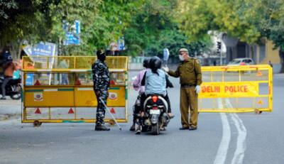 Barriers put on a road to check traffic movement in Delhi during lockdown
