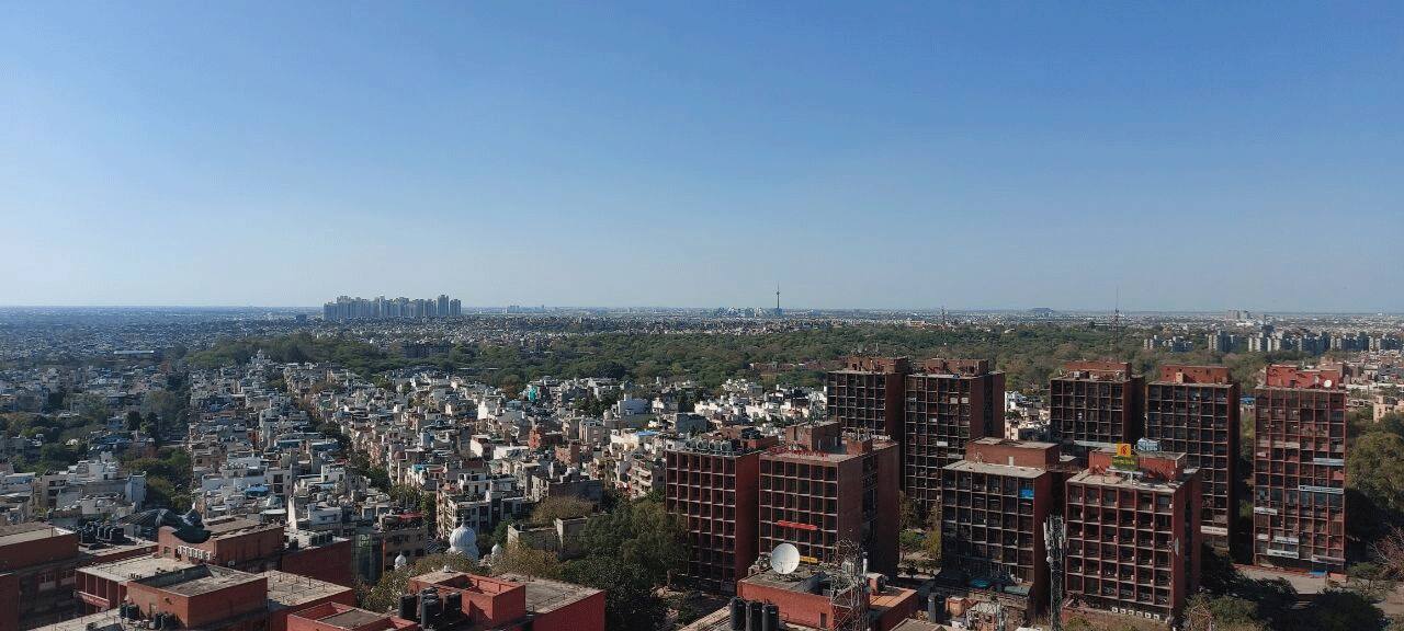 Glimpse of Delhi from GT Karnal Road landfill site