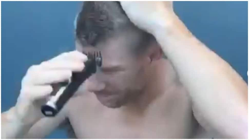  Coronavirus: David Warner shaves head to support COVID-19 front line workers, nominates Virat Kohli, Steven Smith