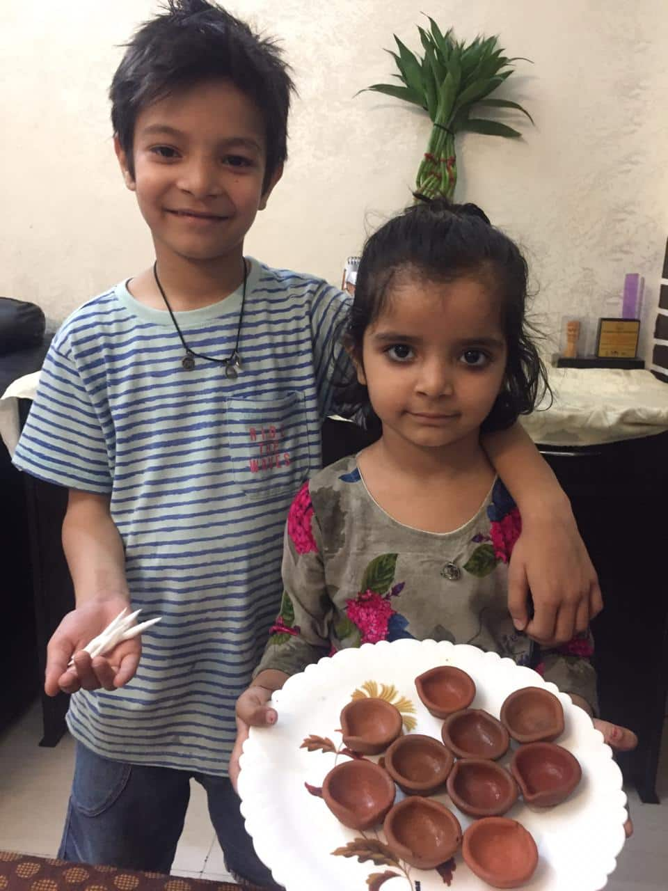 Kids with diyas