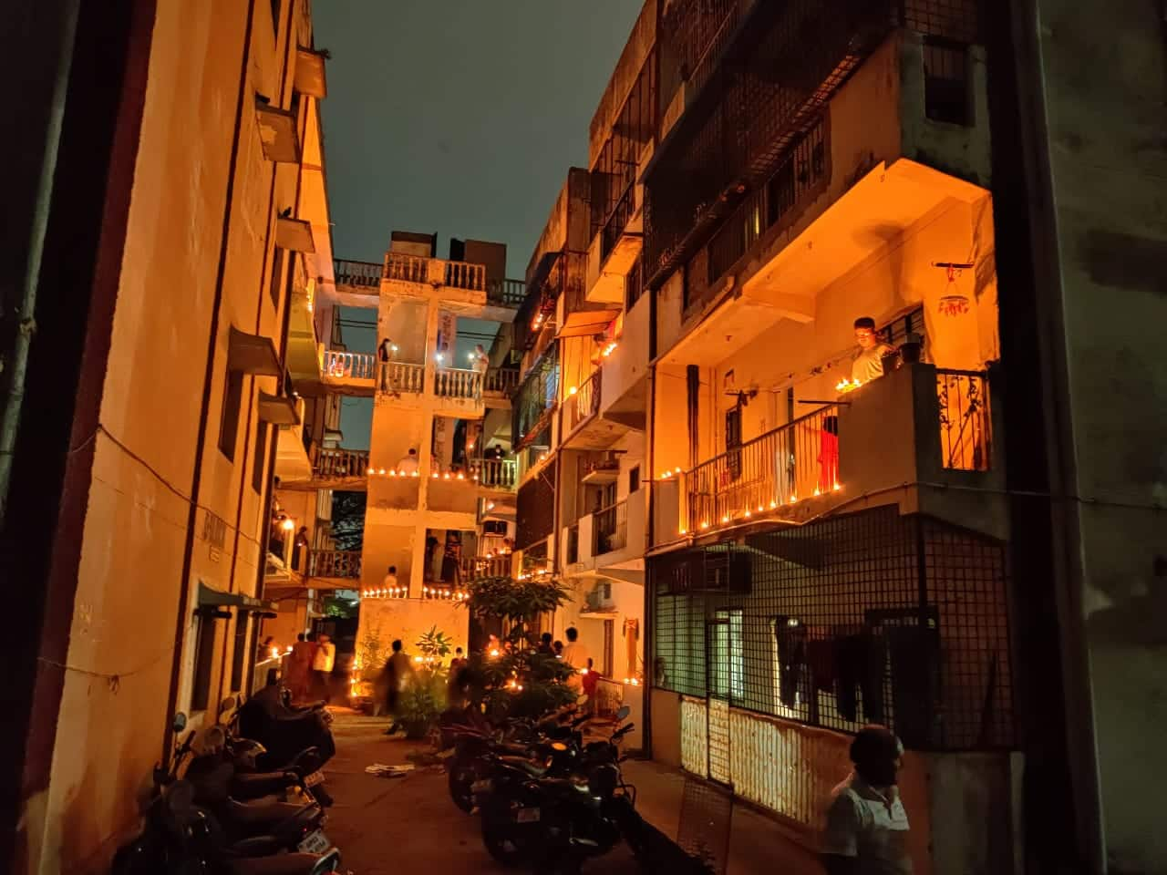 Society in Hyderabad with candles and diyas