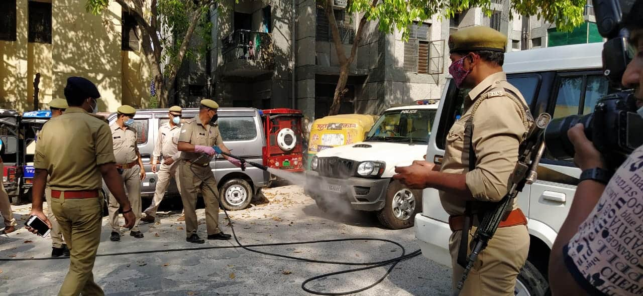 UP police disinfecting vehicle