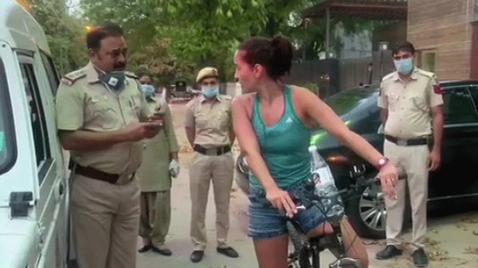 Uruguay woman, who stepped out without mask, argues with police