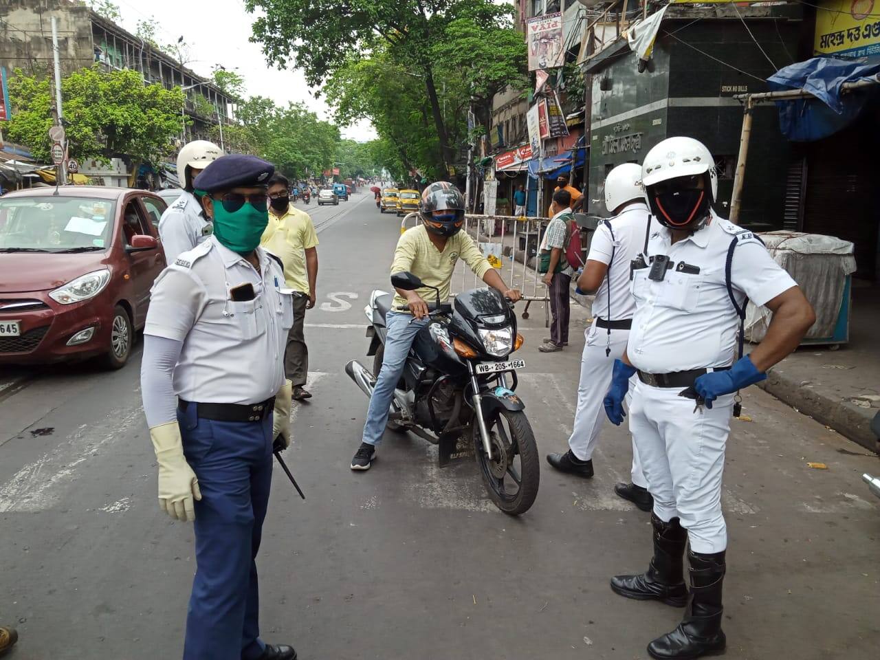 Traffic police check vehicle movement in Kolkata amid lockdown