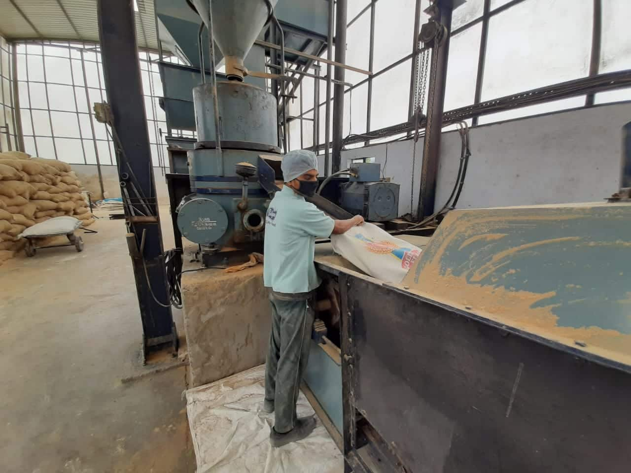 Food-grains getting processed in a factory in Jammu