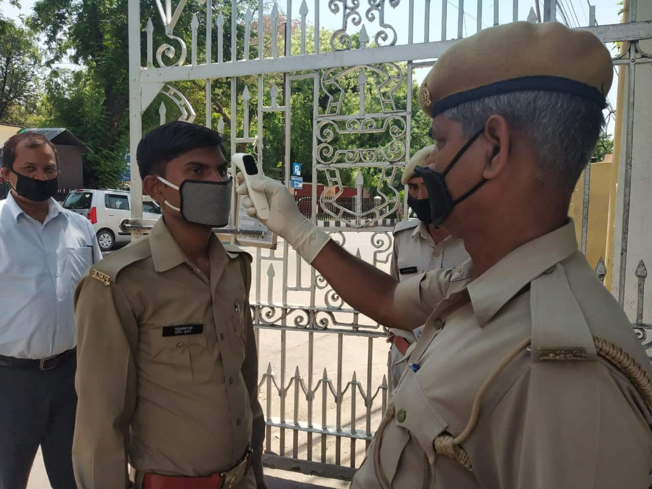 A policeman being screened before entering Vidhan Sabha office