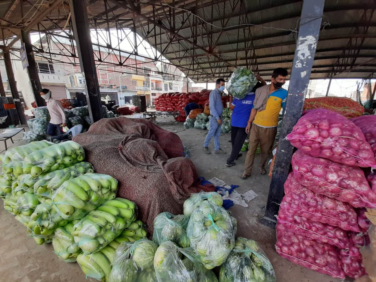 Farmers bringing their produce at a vegetable mandi in Jammu