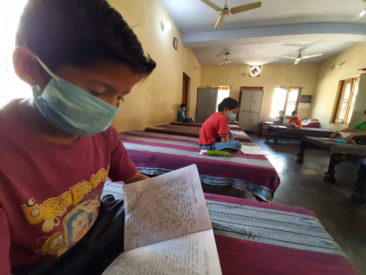 Students studying in a hostel during lockdown