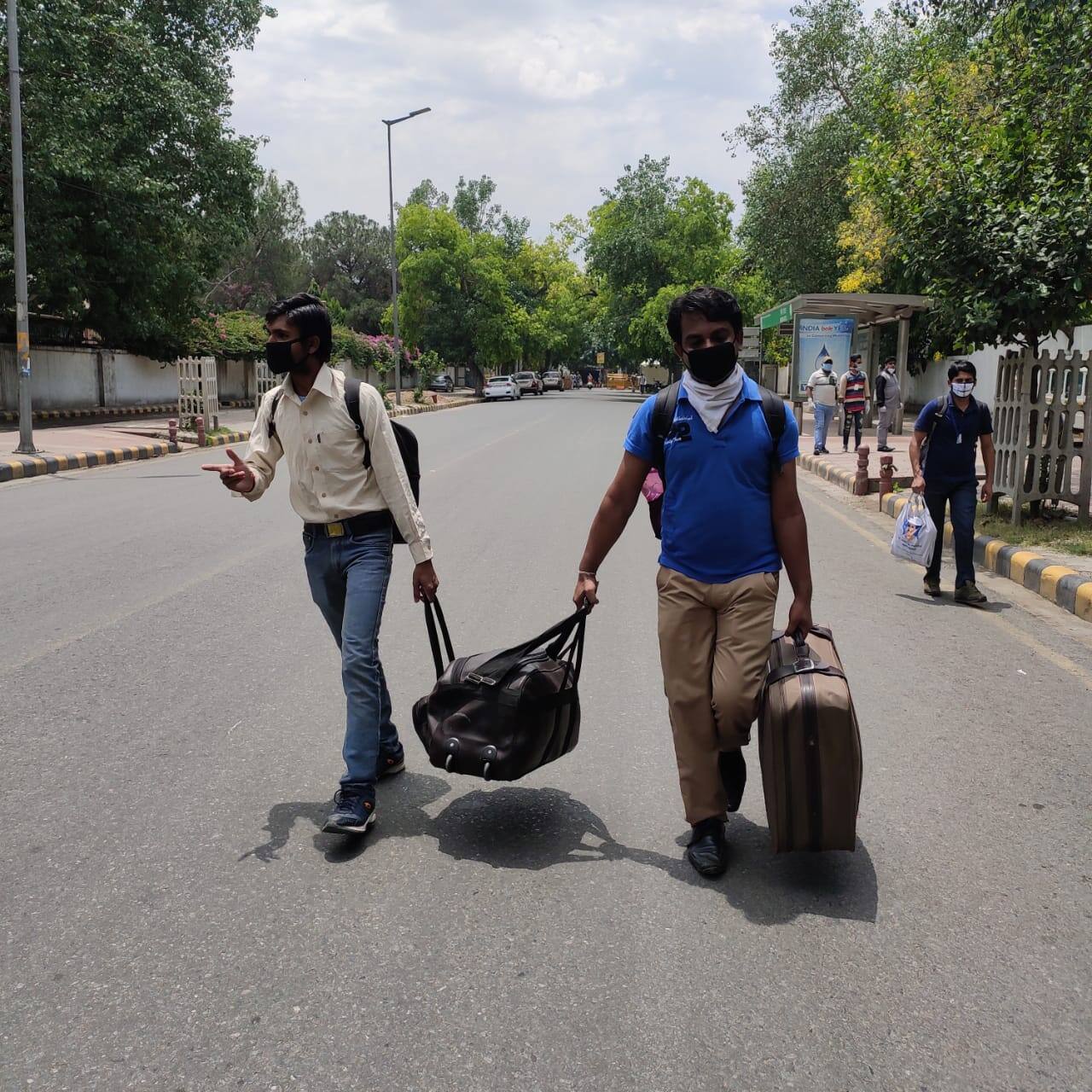People walking towards New Delhi railway station