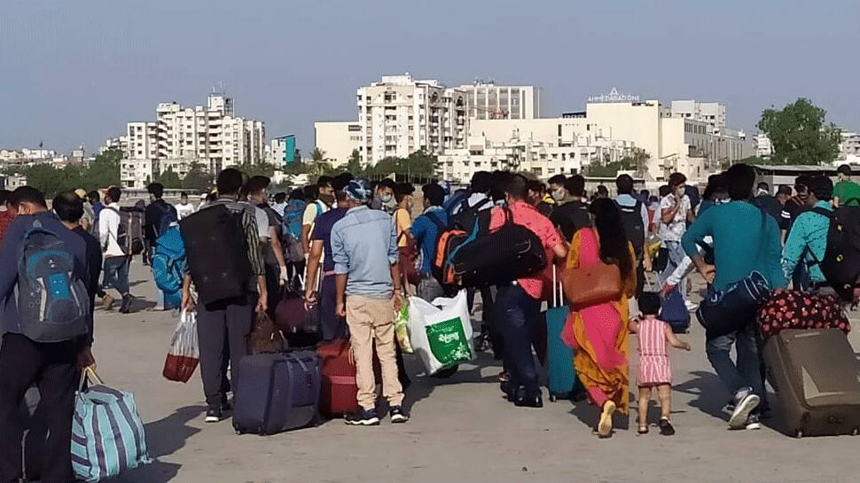 Migrant workers gather at GMDC ground in Ahmedabad, want govt to send them home