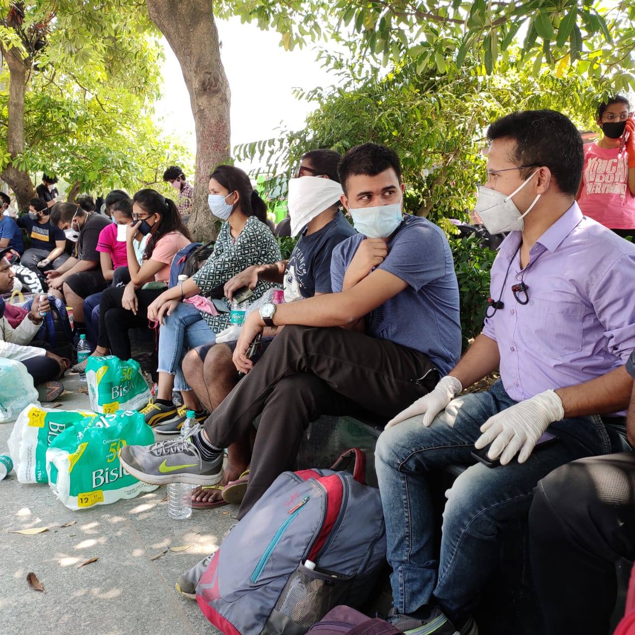 Students waiting outside Delhi's Ambedkar Stadium for screening