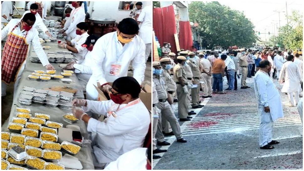 Delhi police showers flowers at Jhandewalan Temple workers who have fed over 18.5 lakh people amid COVID-19 lockdown