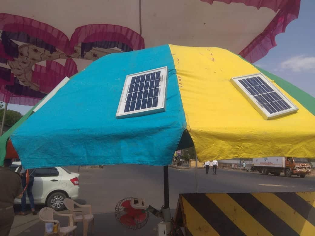 Solar panel umbrella for police in Ahmedabad