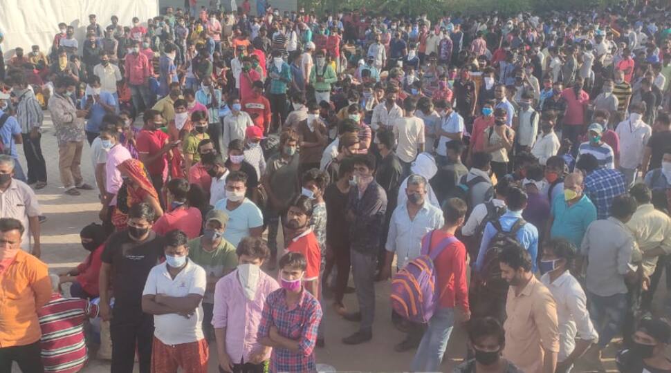 Hundreds of migrant workers gather in Ahmedabad to leave for Bihar