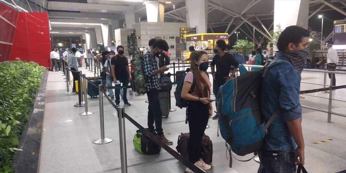 Passengers following social distancing at Delhi airport