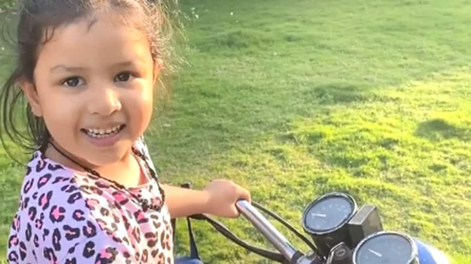 Ziva Dhoni loves to ride a bike like daddy cool MS Dhoni, goes &#039;vroom vroom&#039; in this viral video - Watch 