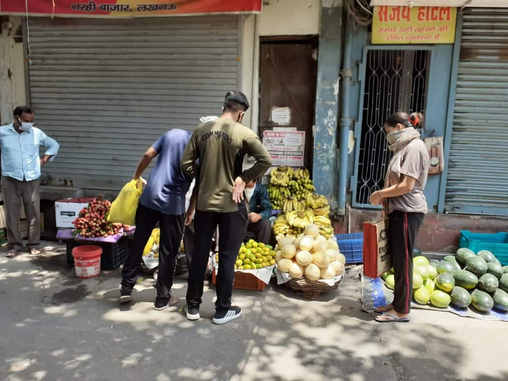 People buying fruits from market in West Bengal on day one of Unlock 1.0